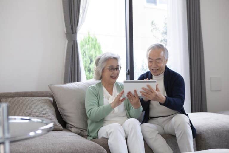 Senior couple on digital device