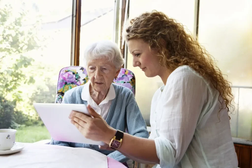 Woman shows website on tablet